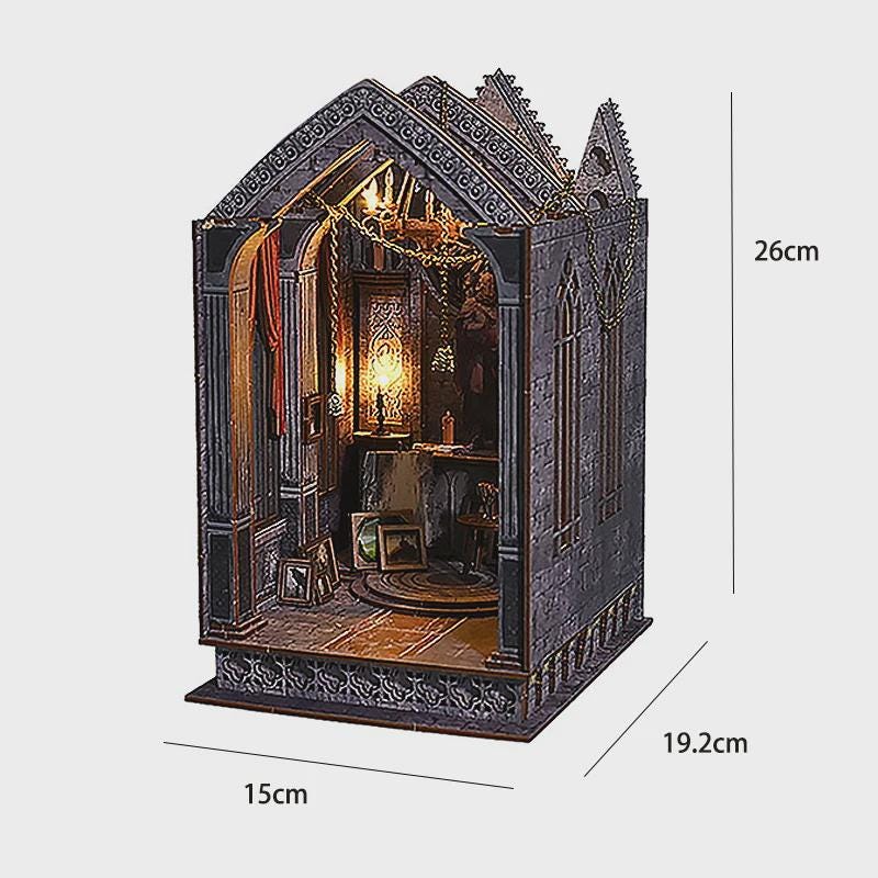May include: A miniature, detailed model of a gothic-style room, measuring 10.2 inches tall, 7.6 inches wide, and 5.9 inches deep. The interior features a warm, inviting glow, with intricate architectural details and a small table. The model is primarily gray and brown.