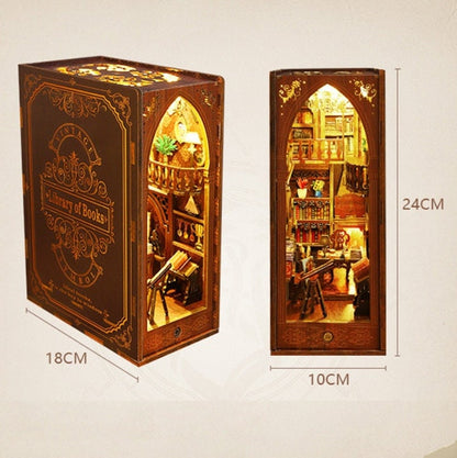 May include: A miniature wooden dollhouse shaped like a book with a detailed interior, including a library, a staircase, and a telescope. The dollhouse is 18 inches wide, 10 inches deep, and 24 inches tall. The front of the dollhouse features a book cover with the text "Vintage Library of Books".