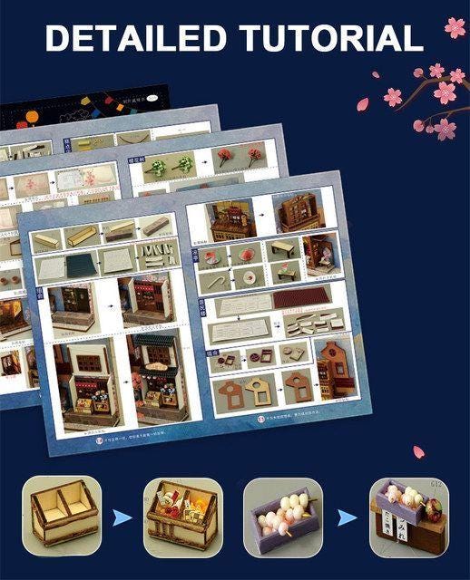 May include: Detailed tutorial image with step-by-step instructions for assembling a miniature Japanese shop. The image features multiple pages with detailed diagrams and close-ups of the components, along with a dark blue background.