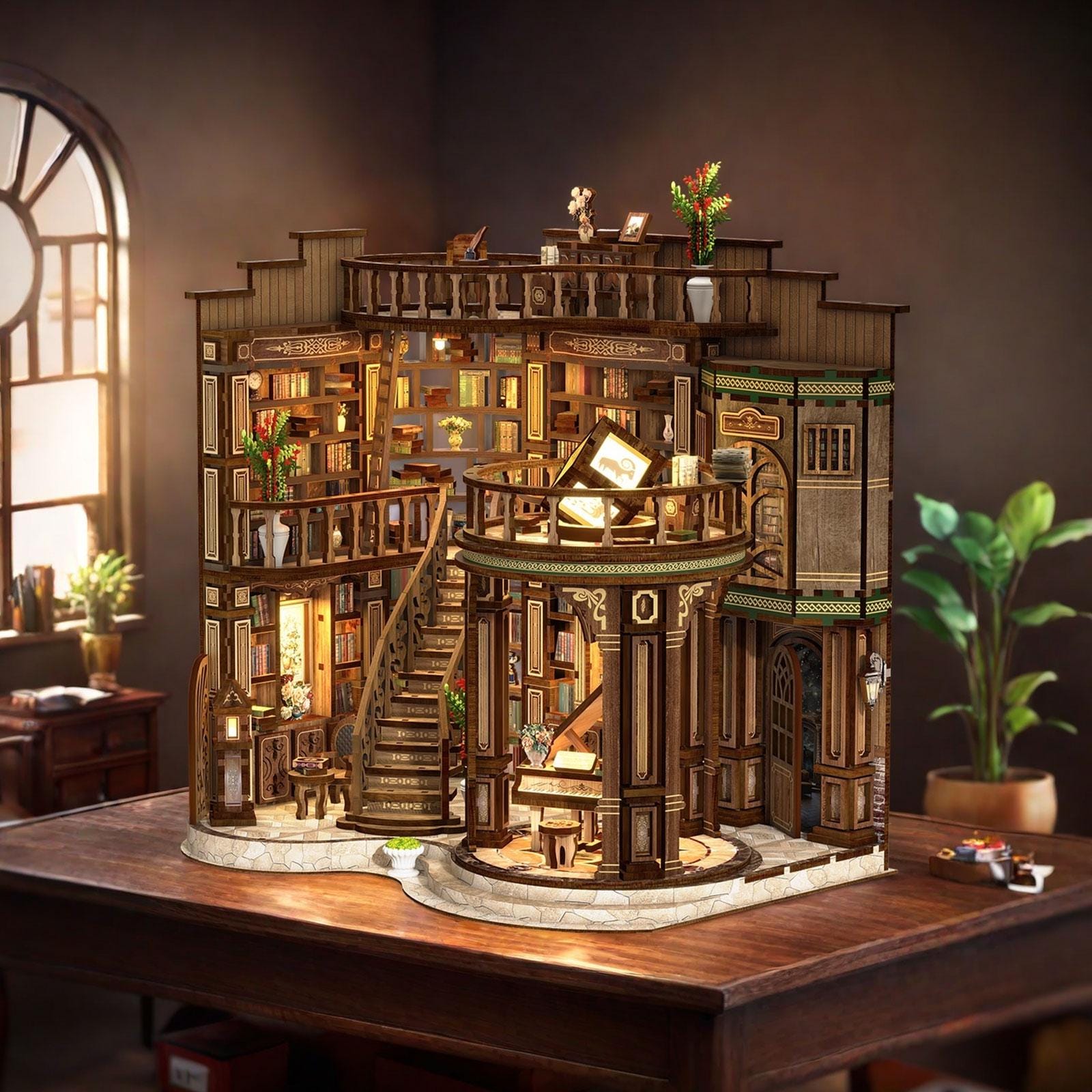 May include: A detailed wooden miniature library model with multiple levels, bookshelves, and a spiral staircase. The model features intricate architectural details, small decorative items, and warm interior lighting, creating a cozy and inviting atmosphere. The model sits on a wooden table.