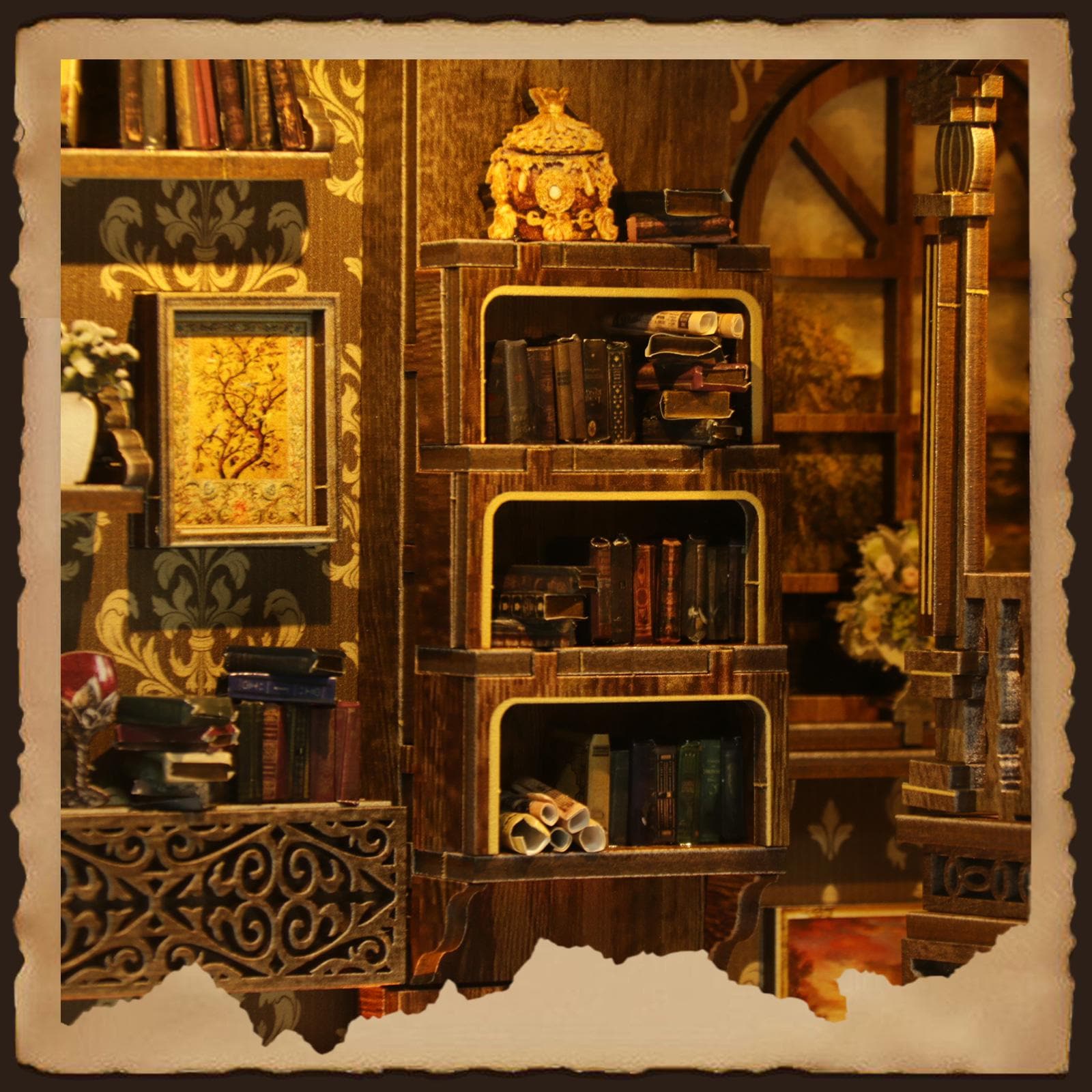 May include: A detailed miniature wooden library scene, featuring bookshelves filled with books and decorative items. The scene includes a framed picture and a decorative jar, all crafted in wood, creating a warm, inviting atmosphere.