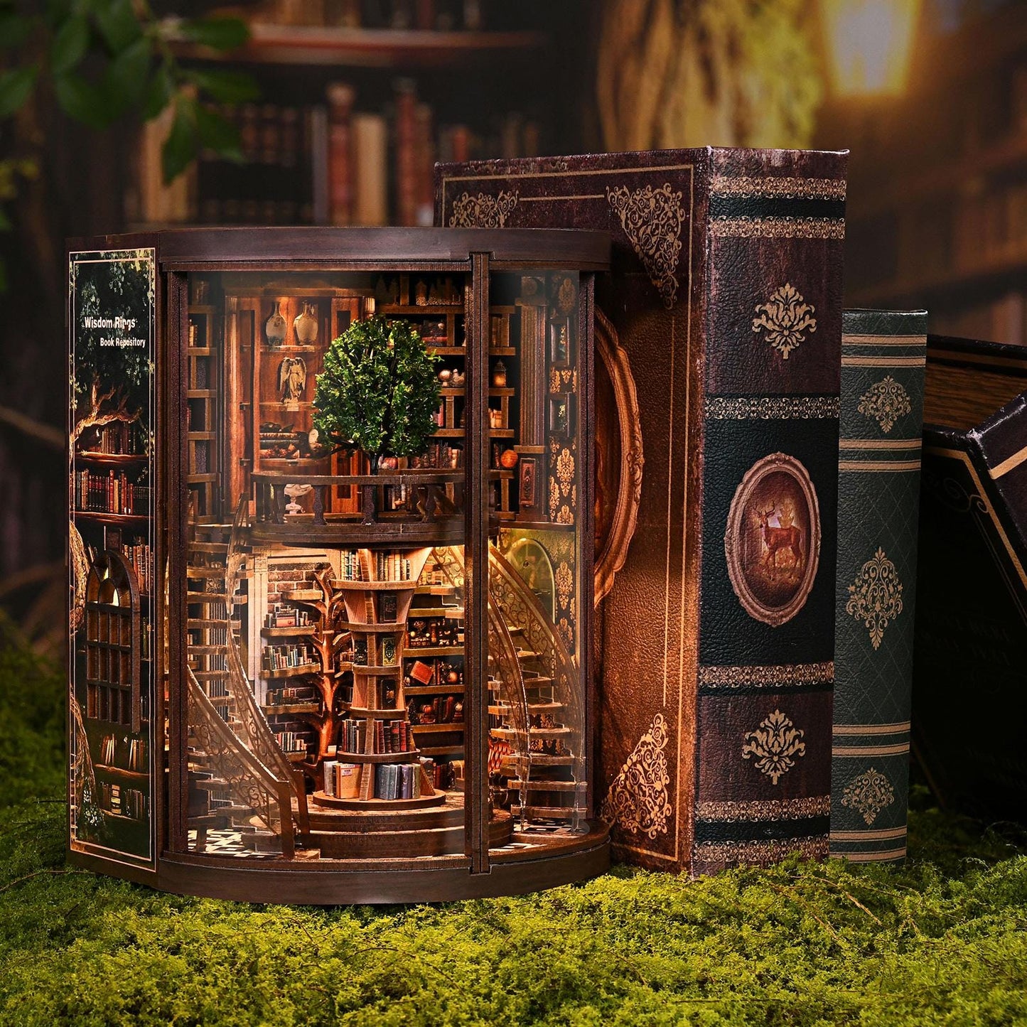 May include: A miniature, illuminated bookshelf diorama with a spiral staircase and a central tree. The diorama is encased in a dark wood frame, with a glass front. Several antique-looking books are placed next to the diorama, with ornate gold detailing.