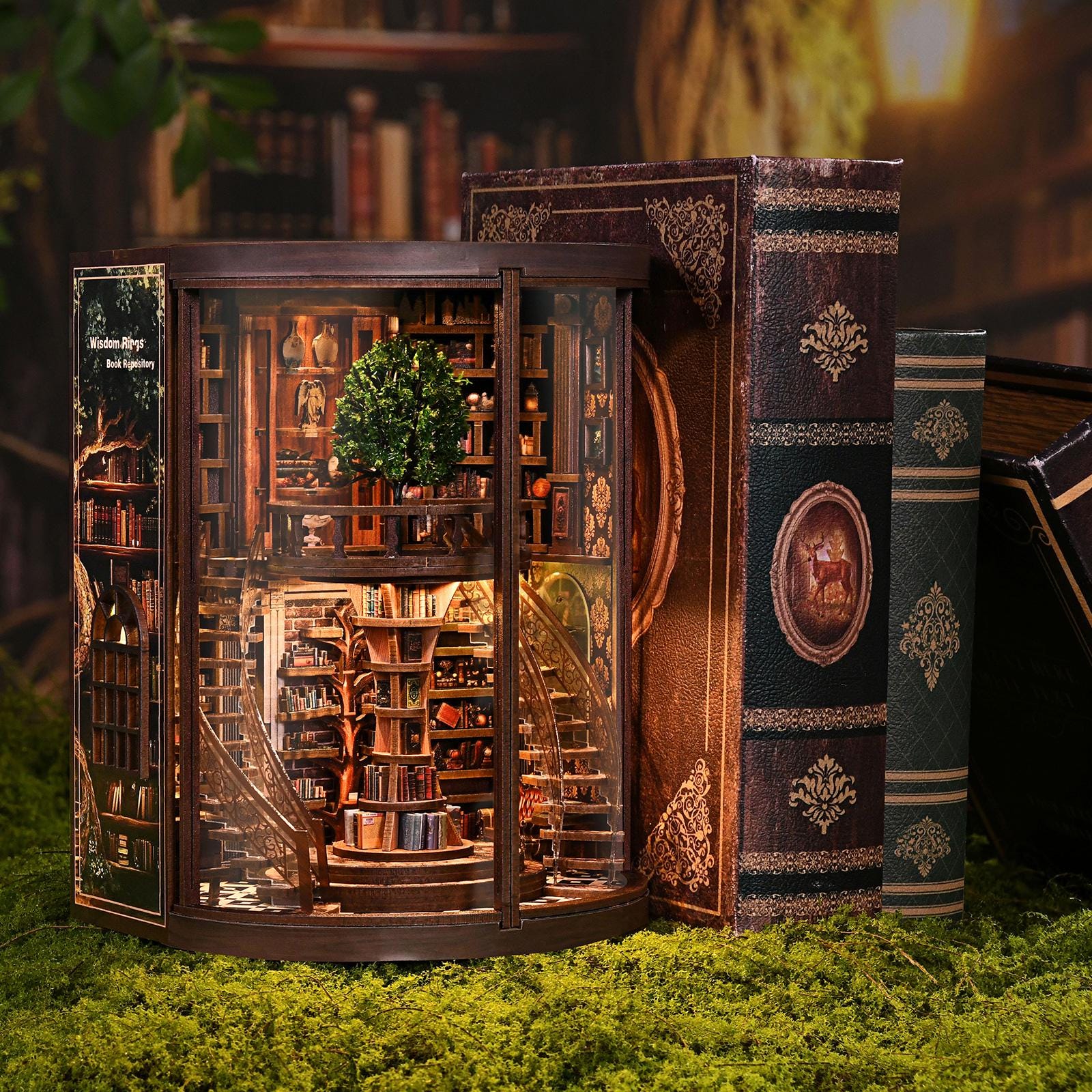 May include: A miniature, illuminated bookshelf diorama with a spiral staircase and a central tree. The diorama is encased in a dark wood frame, with a glass front. Several antique-looking books are placed next to the diorama, with ornate gold detailing.