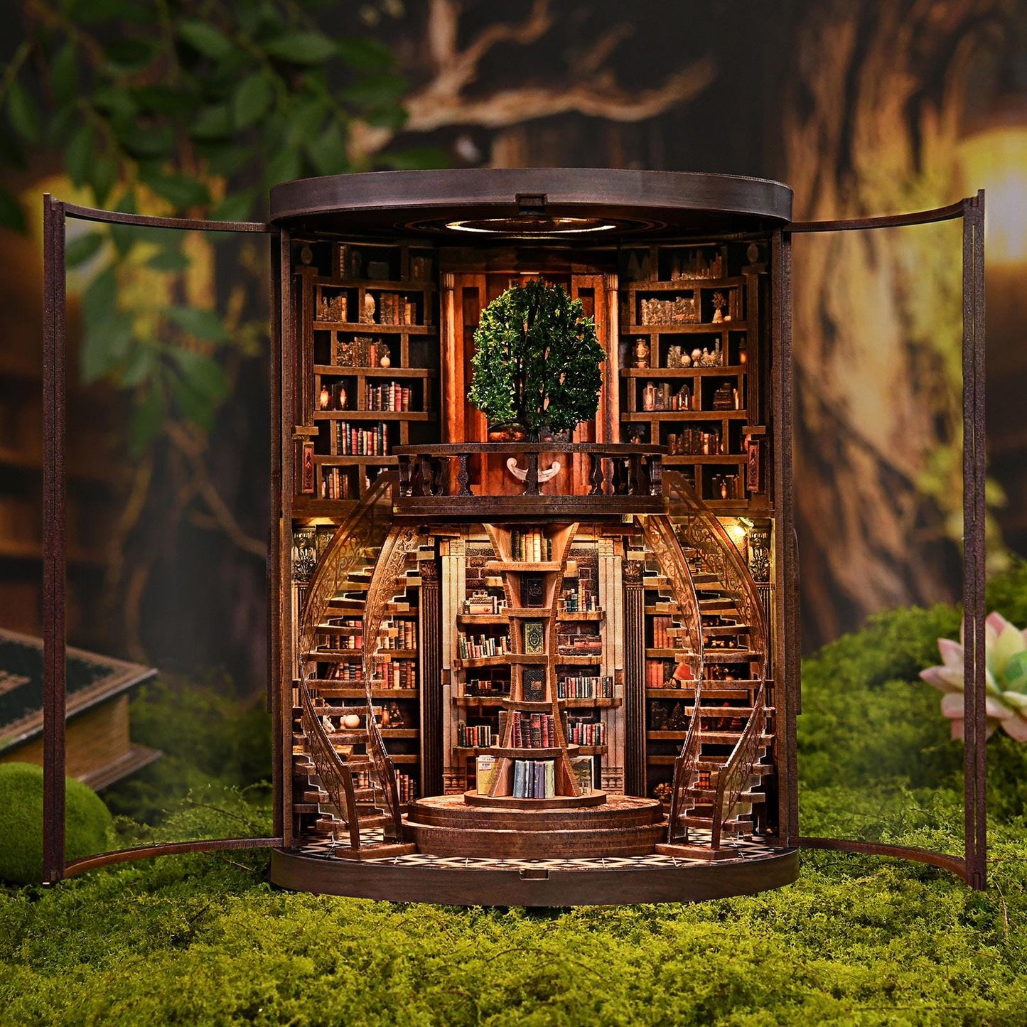 May include: A miniature wooden library with spiral staircases, bookshelves, and a central tree. The interior is illuminated, and the structure is encased in glass doors, set against a backdrop of greenery and moss.